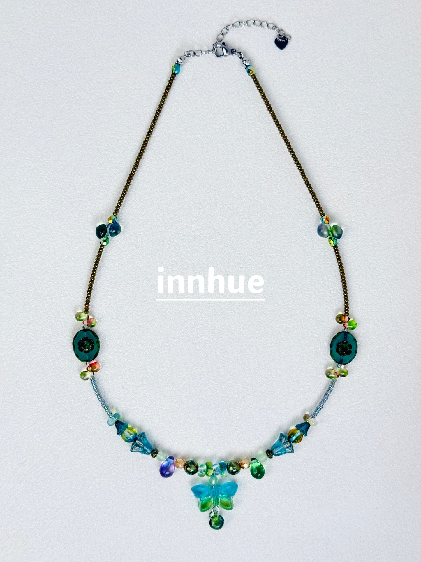 The Bay Nobody Mapped — Teal Butterfly Beaded Necklace